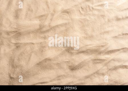 Sand texture close up. Light sandy beach as background. Stock Photo