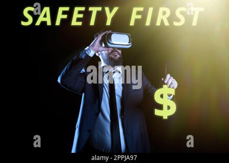 Conceptual display Safety First. Concept meaning Avoid any unnecessary risk Live Safely Be Careful Pay attention Stock Photo