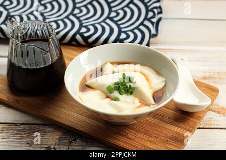 Jimami Dofu Pudding, Okinawa Traditional Tofu with Slices Green Onion Stock Photo