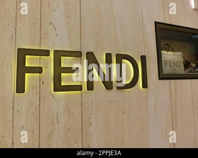 Fendi logo on the wall at Aventura Mall in Florida. Fendi is an Italian luxury fashion house. Stock Photo