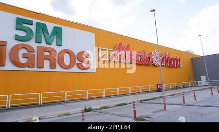 Chorlu, Turkey - September 23, 2022: Migros supermarket logo hanging on a building in Chorlu Stock Photo