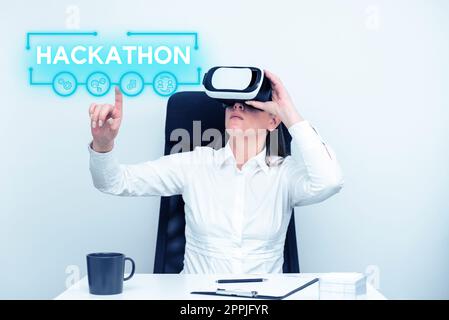 Writing displaying text Hackathon. Word Written on event where large number of people engage in programming Stock Photo