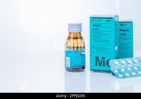 CHONBURI, THAILAND-SEPTEMBER 23, 2022: Meptin syrup in bottle and Meptin tablets in blister pack with paper box packaging. Procaterol hydrochloride. Otsuka Pharmaceutical. Bronchodilator medicine. Stock Photo