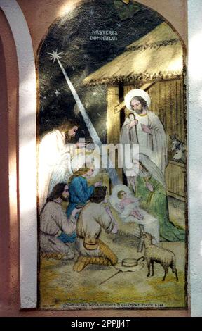 Cața, Brasov County, Romania, 1999. Mural on the facade of the local Christian Orthodox church depicting the Nativity. Stock Photo