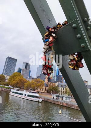 love locks on a bridge in frankfurt at main in germany Stock Photo