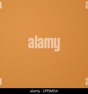 Yellow ocher paper texture background. clean square wallpaper Stock Photo