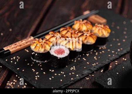 Japanese hot maki roll sushi with tuna - asian food concept Stock Photo