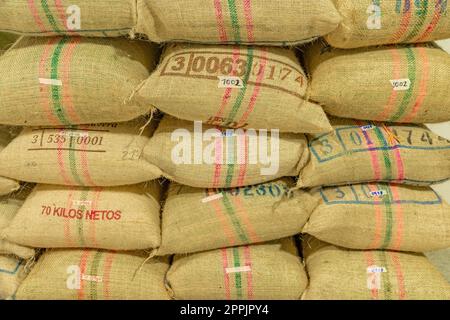 bags of coffee in storage ready for export Stock Photo