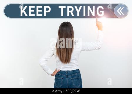 Text sign showing Keep Trying. Internet Concept continue to do something or to do something again and again Stock Photo