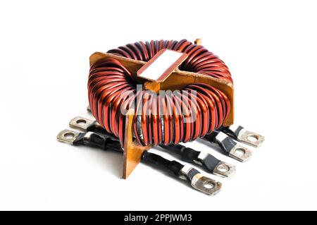 Transformer copper coil isolated on a white background Stock Photo