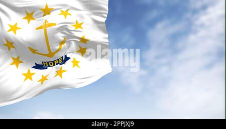 Rhode Island state flag waving on a clear day Stock Photo