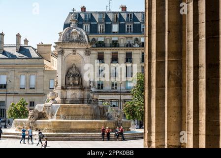 Fountain St Sulpice in front of the same named church in Paris Stock Photo