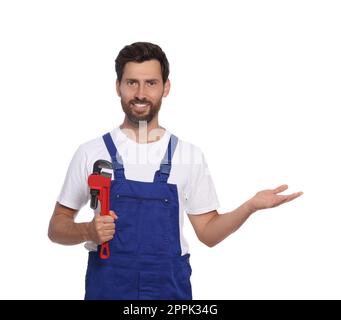 Professional plumber with pipe wrench on white background Stock Photo