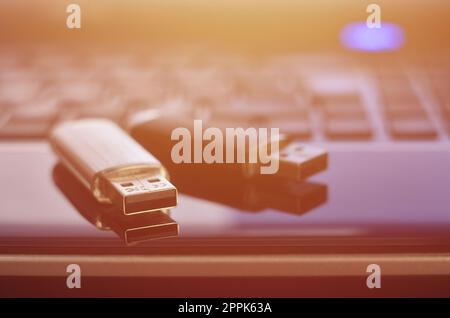 Memory cards on the laptop keyboard Stock Photo