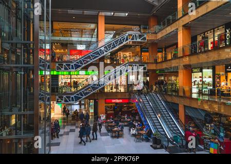 Crowd of people shopping in multi floor shopping mall in Andorra Stock Photo