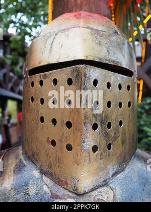 Ancient metal armor, iron detail. Armor, Safety weapon - in antiquity and the Middle Ages, a warriors safety weapon to protect different parts of the body, a piece of forged metal or a kit. Imitation. Stock Photo