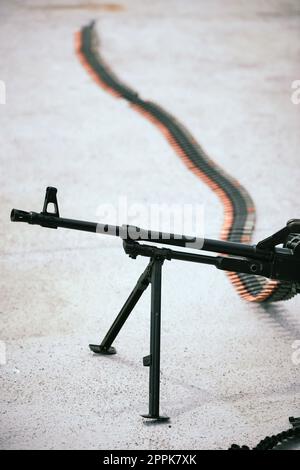 Machine gun belt loaded with cartridges Stock Photo