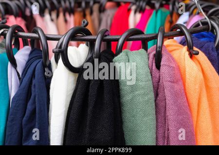 Samples of cloth and fabrics in different colors found at a fabrics market in Germany Stock Photo