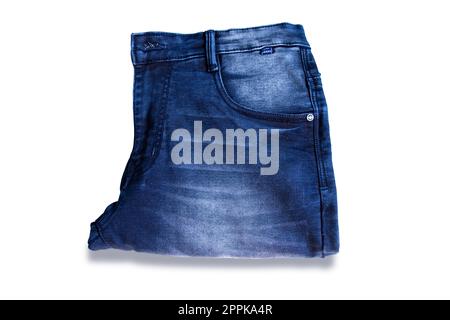 folded blue jeans pant isolated white background Stock Photo