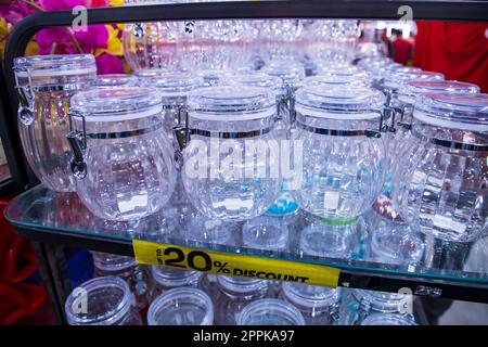 Transparent Plastic jur on a shelf in a supermarket, closeup of photo Stock Photo