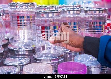 Transparent Plastic jur on a shelf in a supermarket, closeup of photo Stock Photo