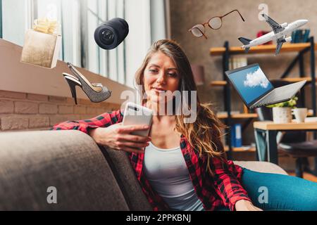 Relaxed woman shopping with mobile app from home Stock Photo