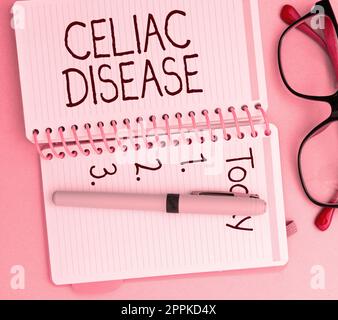 Text sign showing Celiac Disease. Conceptual photo Small intestine is hypersensitive to gluten Digestion problem Stock Photo