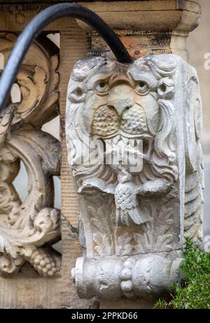 Stone relief decorating the entrances to houses at Mariacka Street in GdaÅ„sk. Stock Photo