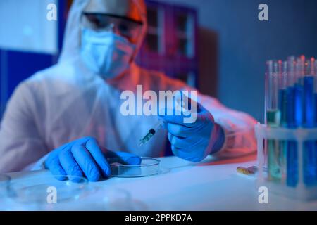 Doctor in the laboratory analyzes samples for scientific research Stock Photo