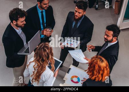People work together in office as teamwork and partner Stock Photo