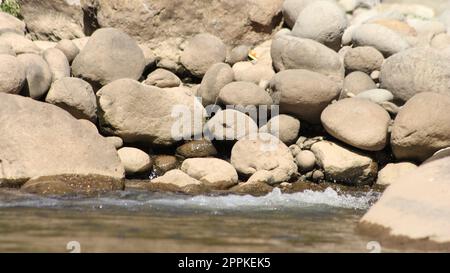 river stone and rocks background Stock Photo