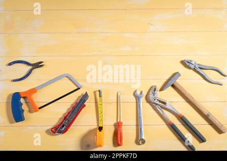 Working tools on wooden rustic background. top view Stock Photo