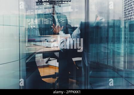 Meeting of business people in an office of a skyscraper Stock Photo
