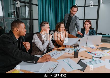 Business people in office connected on internet network analyzing statistics Stock Photo