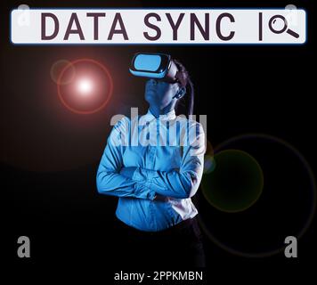 Writing displaying text Data Sync. Concept meaning data that is continuously generated by different sources Stock Photo