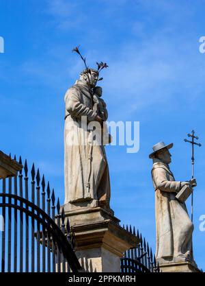 Sculptures of saints in front of 17th century Passion and Marian sanctuary of Bernardine Fathers, Kalwaria Zebrzydowska. Stock Photo