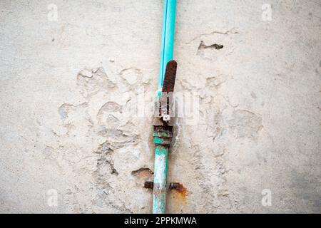 Grunge Metal Water Faucet. Rusted iron water valve control liver handled. Stock Photo