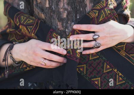 Close up woman hand embracing tree concept photo Stock Photo