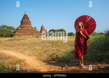 A buddhist Monk in a pagoda in Bagan Myanmar Stock Photo