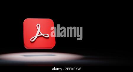 Adobe Acrobat App Icon Spotlighted on Black Background Stock Photo