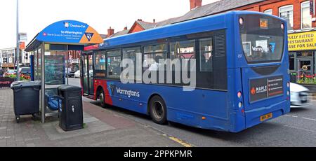 WBC Warringtons own buses, Cat6 bus leaving Stockton Heath village, in the direction of Wilderspool, Warrington, Cheshire, England, UK, WA4 2AL Stock Photo