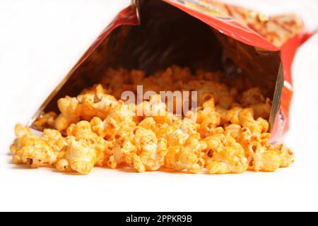 Open Bag of Seasoned Popcorn Isolated on White Background Stock Photo