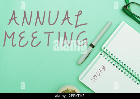 Writing displaying text Annual Meeting. Concept meaning Yearly gathering of an organization interested shareholders Stock Photo