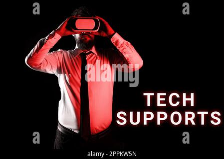 Hand writing sign Tech Supports. Word Written on Help given by technician Online or Call Center Customer Service Stock Photo