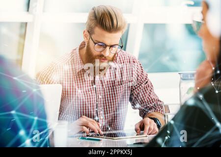 Businessman works in office with a tablet. Concept of internet sharing Stock Photo