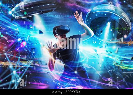 Shocked boy plays with online ufo videogames. Concept of technology and entertainment Stock Photo
