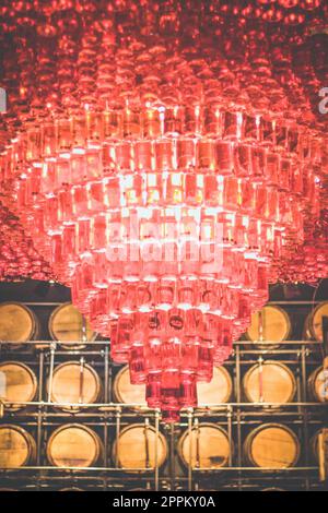 Close up wonderful luster hanging in wine cellar concept photo Stock Photo