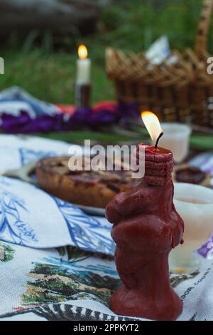 Close up burning candle on picnic concept photo Stock Photo