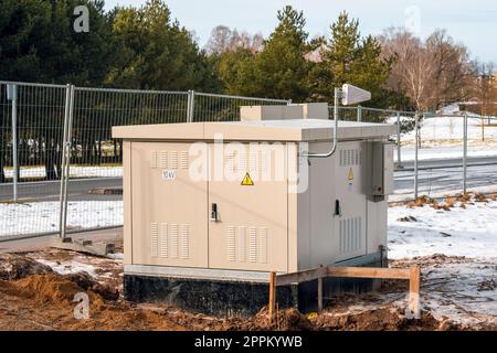 New electric control cabinet stand at new construction site Stock Photo