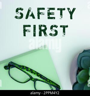 Handwriting text Safety First. Business concept Avoid any unnecessary risk Live Safely Be Careful Pay attention Stock Photo